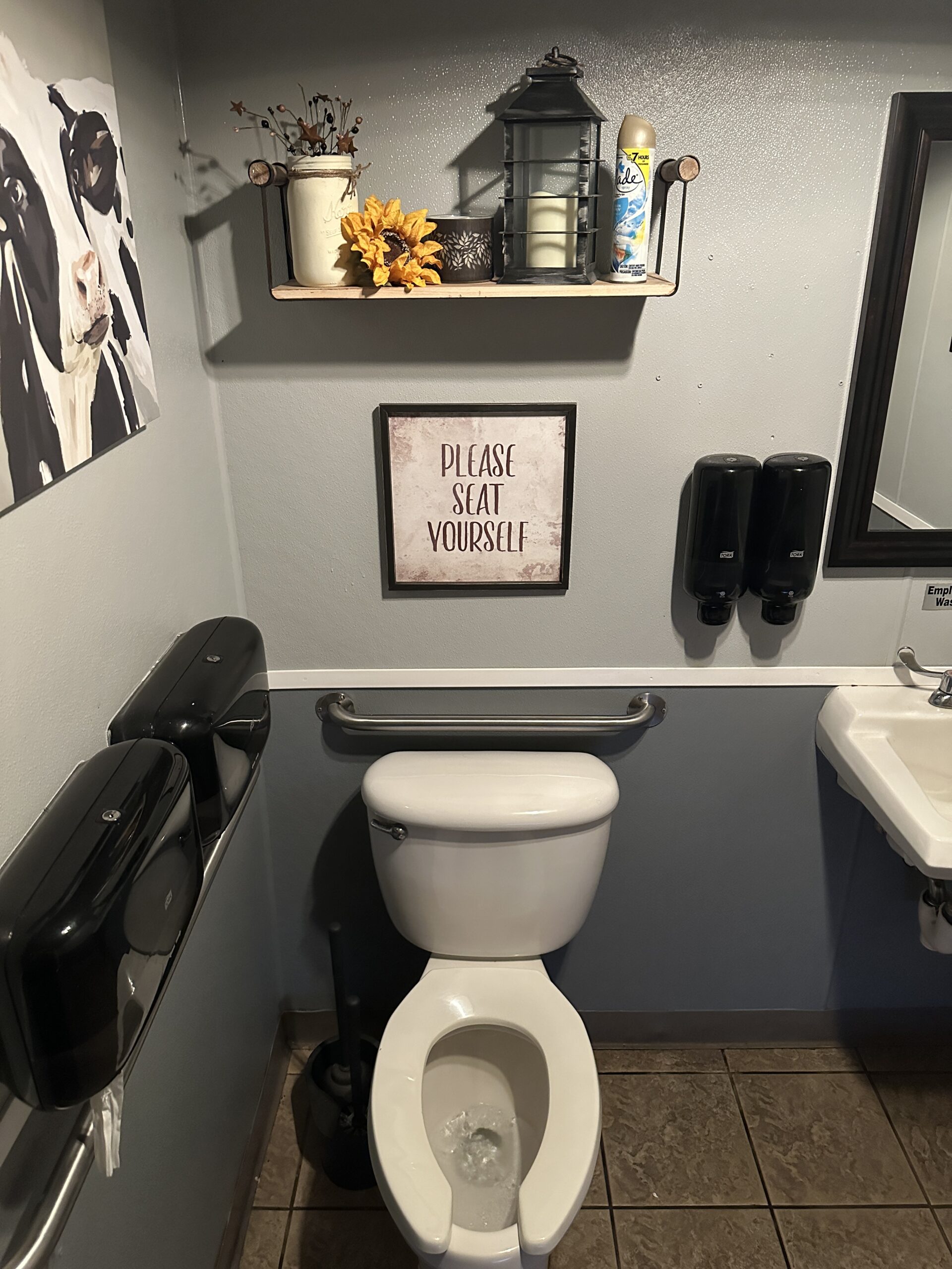 Glade can on the back of a toilet