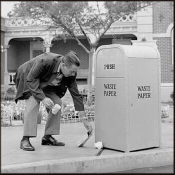 Walt picking up trash at Disneyland
